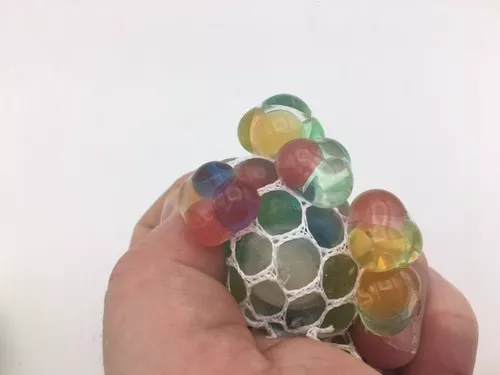 100 Stress Mesh Balls in 2" Capsules for Parties or Vending *Best Seller in all age groups*